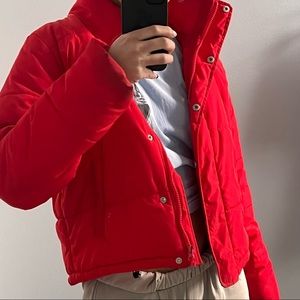 Red puffer coat
